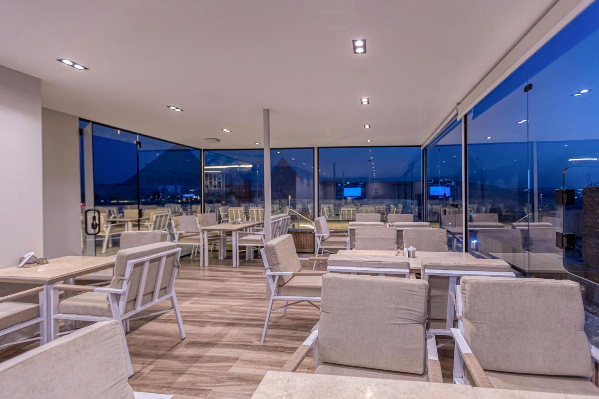 Gaia Pyramids Hotel Kafret el-Gabal Exterior foto